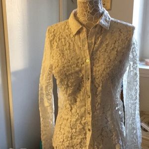 Very nice button down lace blouse.